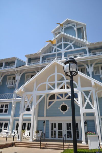Beach Club Resort Disney World entrance with light blue facade and white trim
