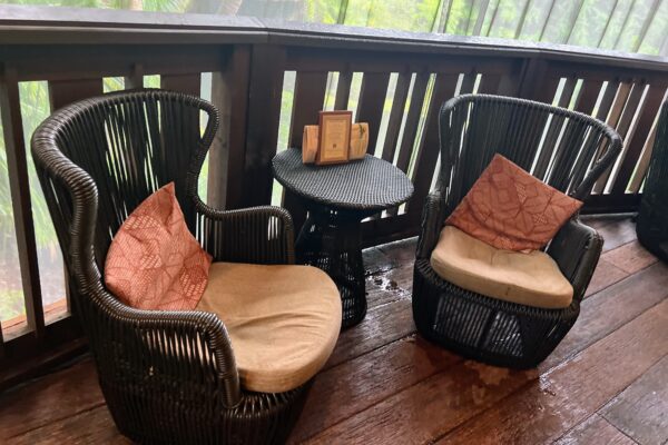 Seating on the porch at Nomad Lounge