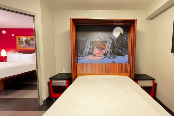 Disney's Art of Animation Resort room featuring Cars-themed decor and a Murphy bed.