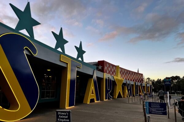 Disney's All-Star Music Resort entrance with large "STAR" sign and blue stars