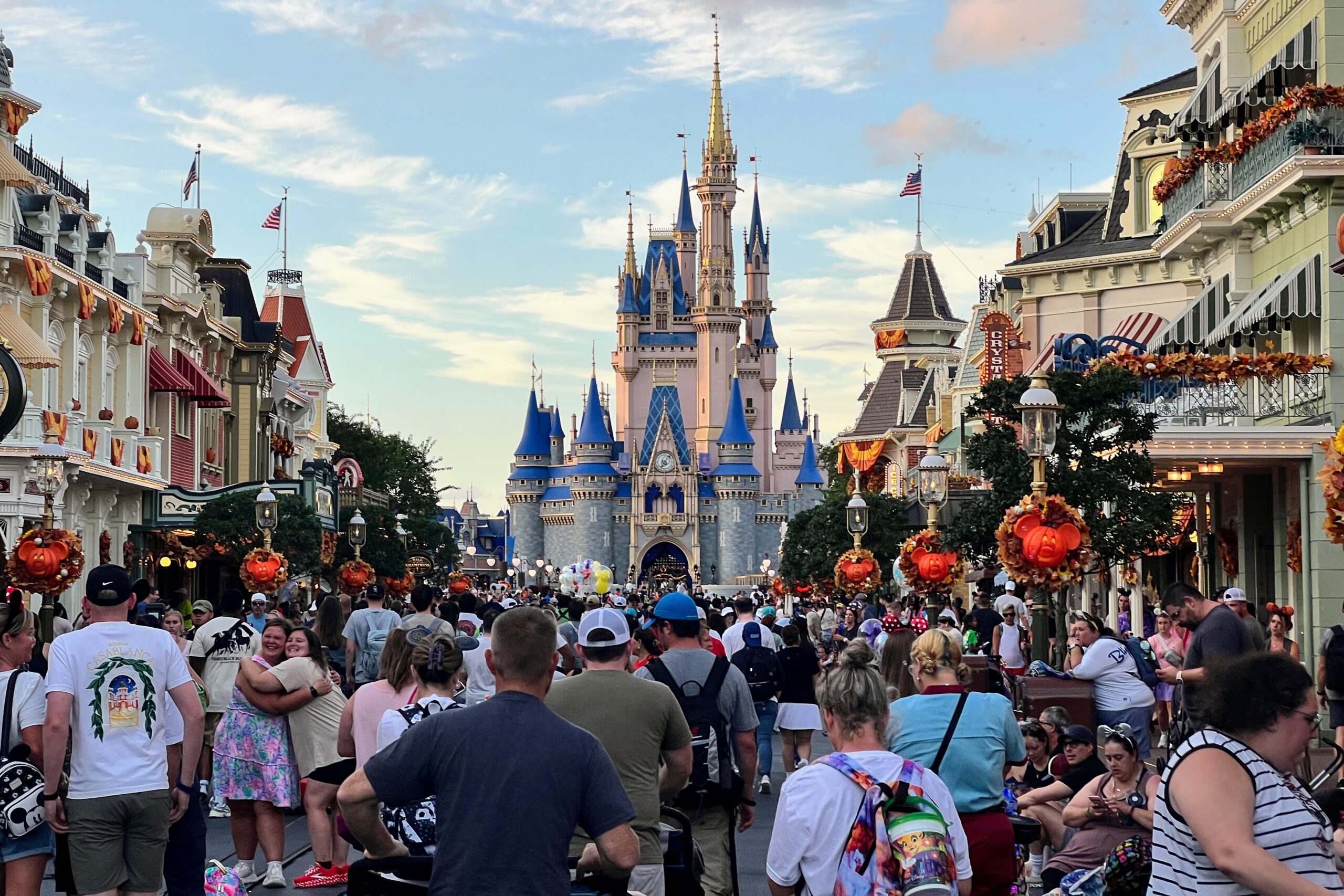 Crowded Main Street U.S.A. at Magic Kingdom with Cinderella Castle